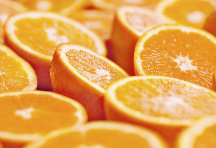 background of juicy fresh sliced oranges
