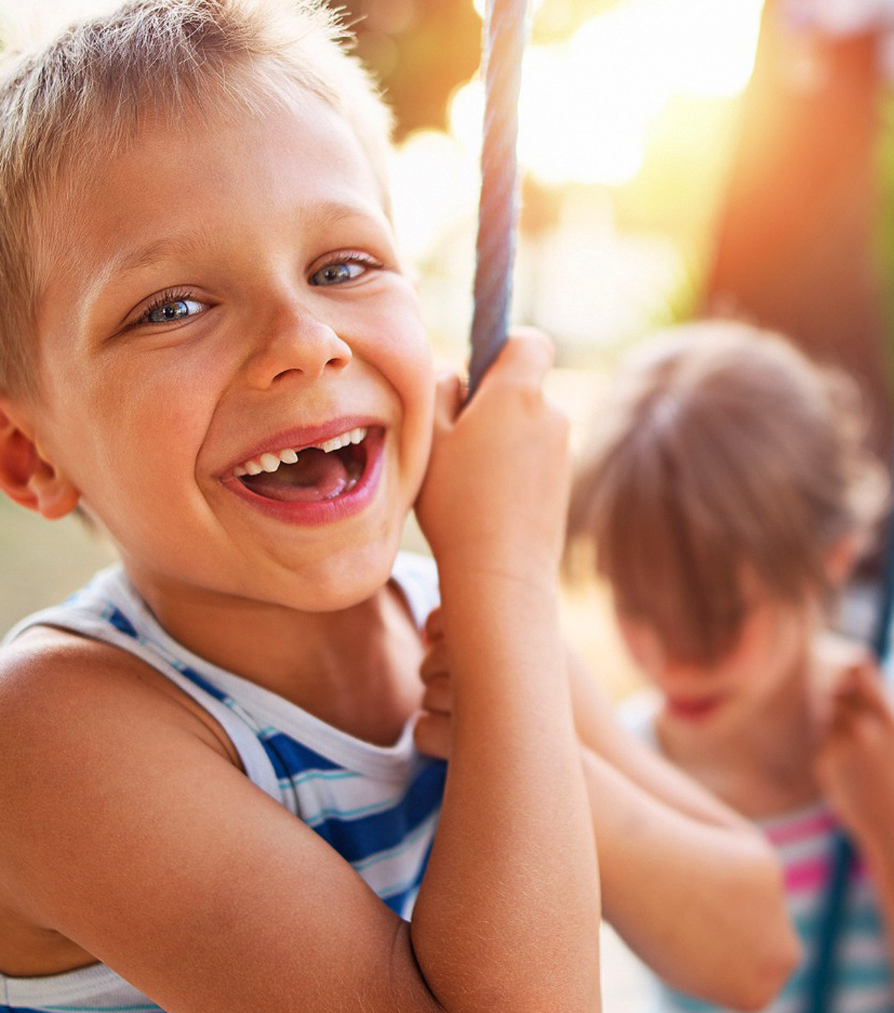 Sunquick customer image - boy fun on swing sharper